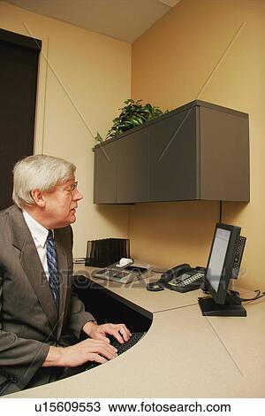 Businessman at work View Large Photo Image Stock Image - Businessman at work. Fotosearch