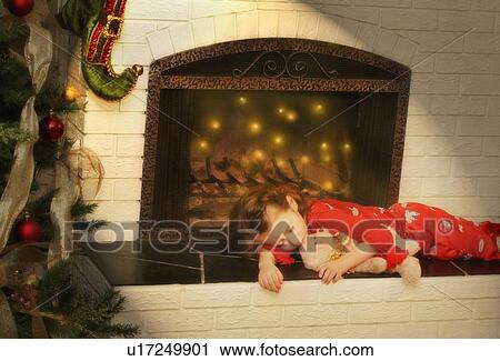 Child falls asleep waiting for Santa View Large Photo Image Stock Image - Child falls asleep waiting for Santa. Fotosearch