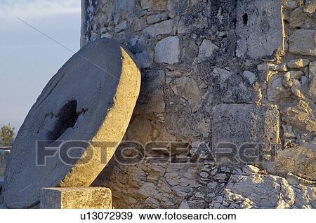 Stock Photo - Closeup of a millstone. Fotosearch