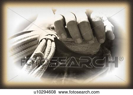 Stock Photo - Closeup of cowboy's hand. Fotosearch