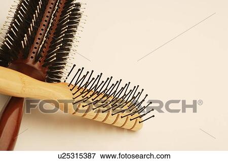 Stock Photo - Closeup of hair brushes. Fotosearch
