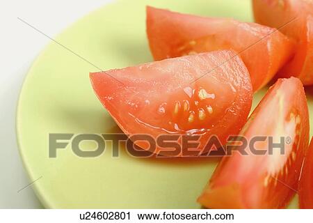 Closeup of sliced tomato View Large Photo Image Stock Image - Closeup of sliced tomato. Fotosearch