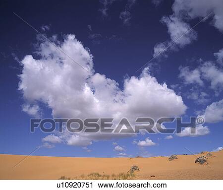 Clouds above sand dunes View Large Photo Image Stock Image - Clouds above sand dunes. Fotosearch