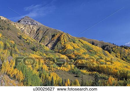 Colourful autumnal valley View Large Photo Image Stock Photo - Colourful autumnal valley. Fotosearch