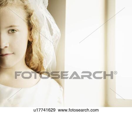Girl with first communion dress View Large Photo Image Stock Photo - Girl with first communion dress. Fotosearch