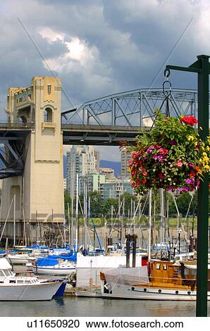 Hanging basket in harbour View Large Photo Image Stock Image - Hanging basket in harbour. Fotosearch