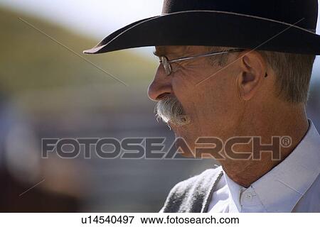 Man with cowboy hat View Large Photo Image Stock Photo - Man with cowboy hat. Fotosearch