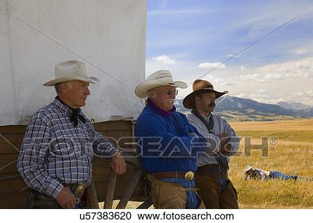 Stock Image - Men decide to take a break. Fotosearch