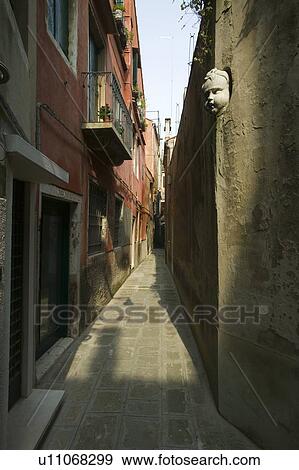 Stock Photo - Narrow street in Italy. Fotosearch