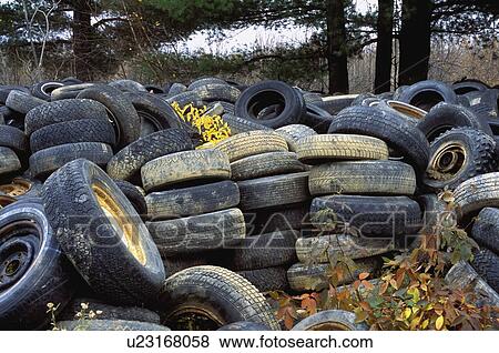Old tires in a heap View Large Photo Image Stock Photo - Old tires in a heap. Fotosearch