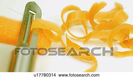 Peeling carrot View Large Photo Image Picture - Peeling carrot. Fotosearch