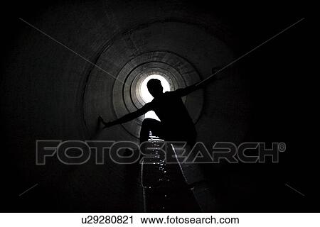 Person in tunnel View Large Photo Image Stock Image - Person in tunnel. Fotosearch