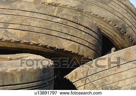 Pile of old rubber tires View Large Photo Image Stock Photo - Pile of old rubber tires. Fotosearch
