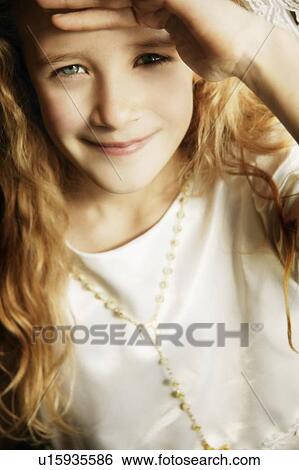 Portrait of a girl wearing prayer beads View Large Photo Image Stock Photograph - Portrait of a girl wearing prayer beads. Fotosearch