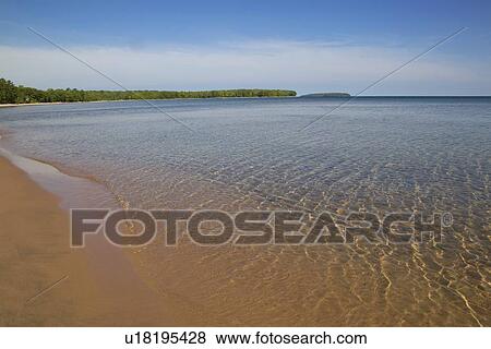 Pristine water on shore View Large Photo Image Stock Photo - Pristine water on shore. Fotosearch