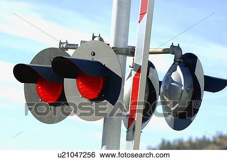 Railroad crossing light View Large Photo Image Stock Photograph - Railroad crossing light. Fotosearch