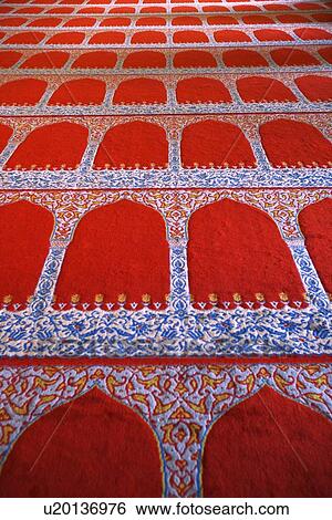 Repeating pattern on red carpet View Large Photo Image Stock Photograph - Repeating pattern on red carpet. Fotosearch