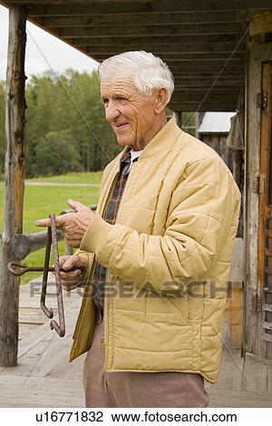Ringing the dinner bell View Large Photo Image Stock Image - Ringing the dinner bell. Fotosearch