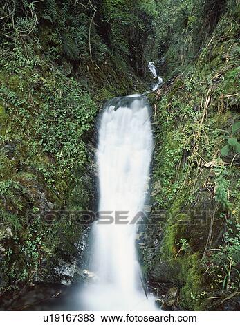 Rushing waterfall View Large Photo Image Stock Image - Rushing waterfall. Fotosearch