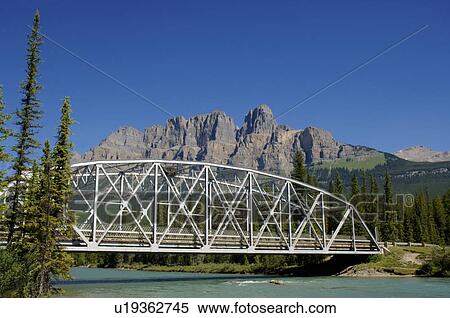 Stock Photography - Scenic bridge and mountains. Fotosearch