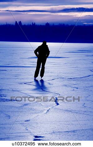 Skating on a frozen lake View Large Photo Image Stock Photography - Skating on a frozen lake. Fotosearch