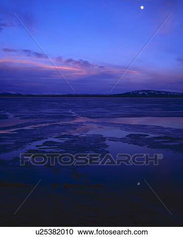 Stock Image - Spring ice break-up on Yellowstone Lake. Wyoming, USA. Fotosearch