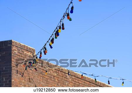 Stock Image - String of Christmas lights. Fotosearch