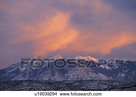Sunset glow over mountain View Large Photo Image Picture - Sunset glow over mountain. Fotosearch