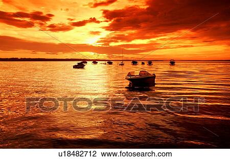 Stock Image - Sunset on a lake. Fotosearch