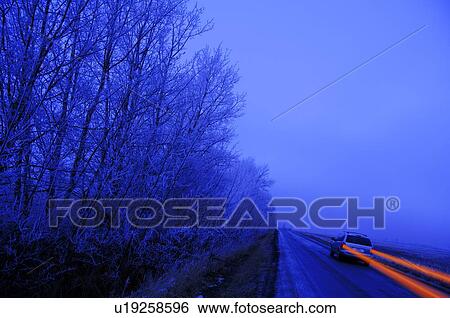 Traveling at dusk View Large Photo Image Stock Photograph - Traveling at dusk. Fotosearch