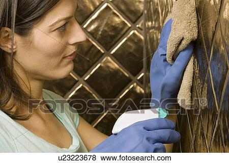 Stock Photo - Woman doing chores. Fotosearch