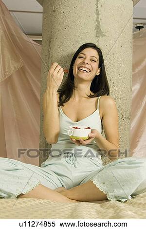 Woman eating strawberries View Large Photo Image Stock Photography - Woman eating strawberries. Fotosearch