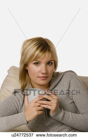 Woman holding coffee mug View Large Photo Image Stock Photo - Woman holding coffee mug. Fotosearch