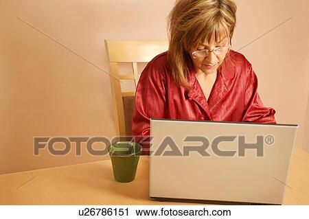 Woman with laptop computer View Large Photo Image Stock Image - Woman with laptop computer. Fotosearch