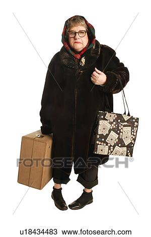 Stock Image - Woman with luggage. Fotosearch