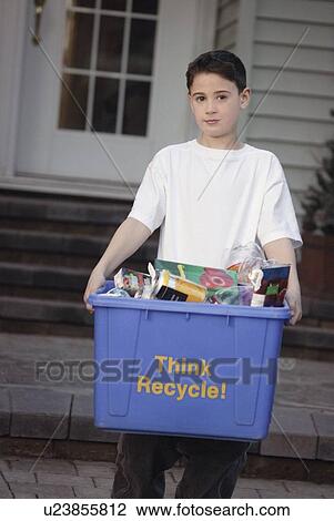 Young boy recycling View Large Photo Image Stock Image - Young boy recycling. Fotosearch