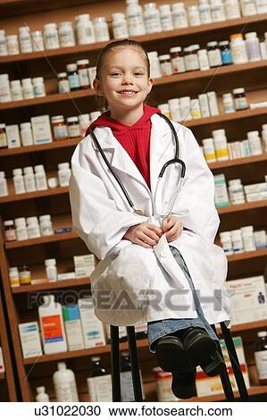 A child pharmacist View Large Photo Image Stock Image - A child pharmacist. Fotosearch