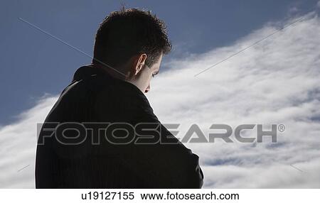 A man turned towards an open sky View Large Photo Image Stock Photography - A man turned towards an open sky. Fotosearch