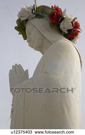 Adorned female statue View Large Photo Image Stock Image - Adorned female statue. Fotosearch