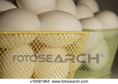 Picture - Baskets of eggs. Fotosearch
