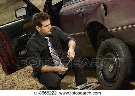 Changing a flat View Large Photo Image Stock Image - Changing a flat. Fotosearch