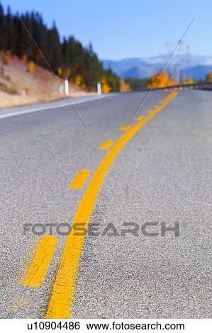 Stock Photograph - Closeup of a road. Fotosearch