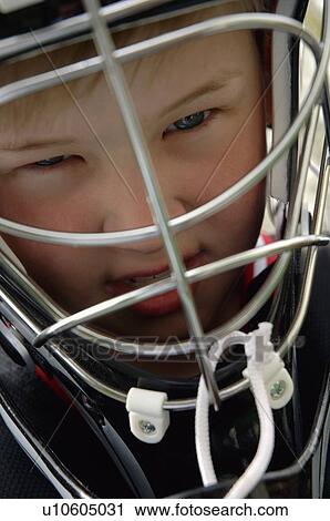 Stock Image - Closeup of child with helmet. Fotosearch