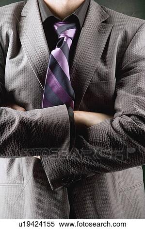 Stock Photography - Closeup of man with suit. Fotosearch