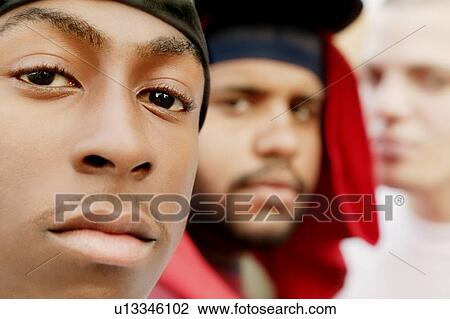 Closeup of men's faces View Large Photo Image Stock Image - Closeup of men's faces. Fotosearch