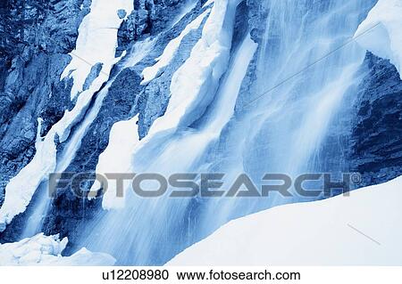 Stock Image - Closeup of winter waterfall. Fotosearch