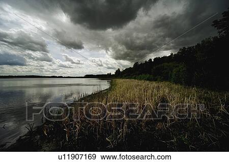 Stock Photo - Cloudy lake. Fotosearch