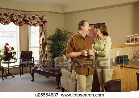 Couple enjoying each other's company View Large Photo Image Stock Photo - Couple enjoying each other's company. Fotosearch