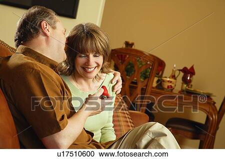 Stock Image - Couple laughing together. Fotosearch