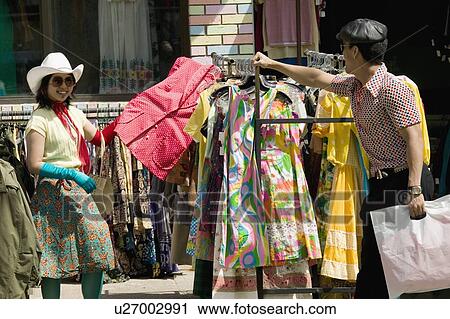 Stock Image - Couple shopping together. Fotosearch